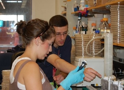 two people doing research in a lab