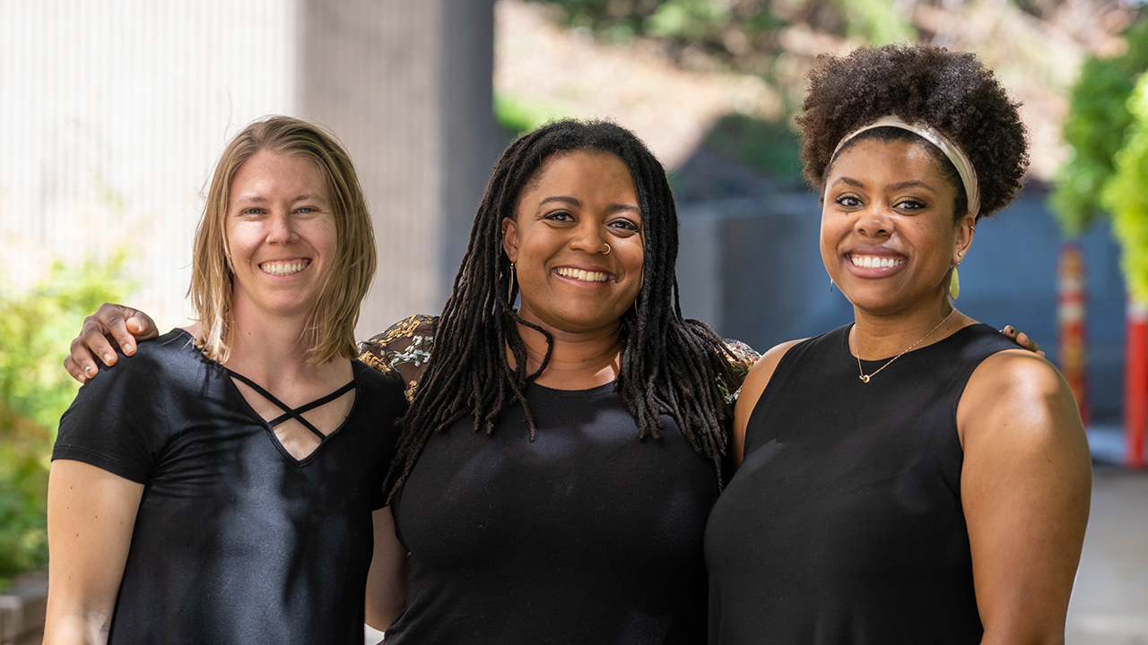 Suglia and Roberts Hugghis (right) succeeded Victoria Watson-Zink (center) as graduate advisors to the CBS dean for DEIJ. 