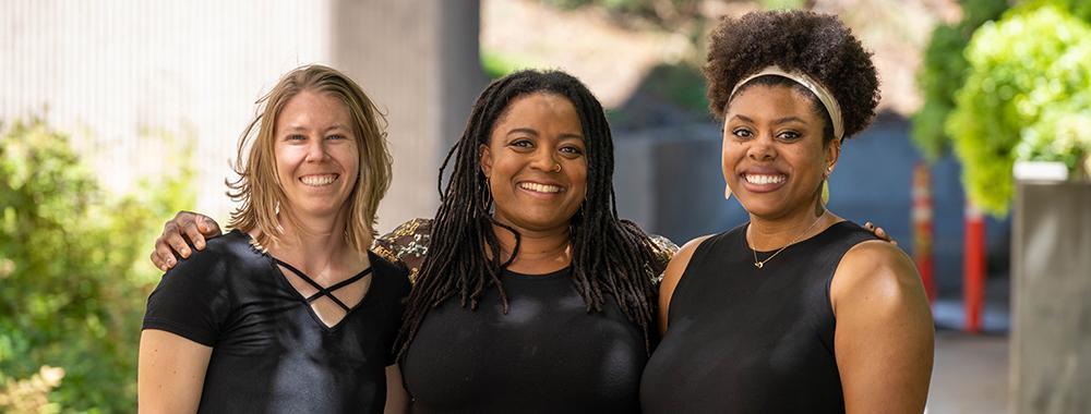 Three ladies smiling