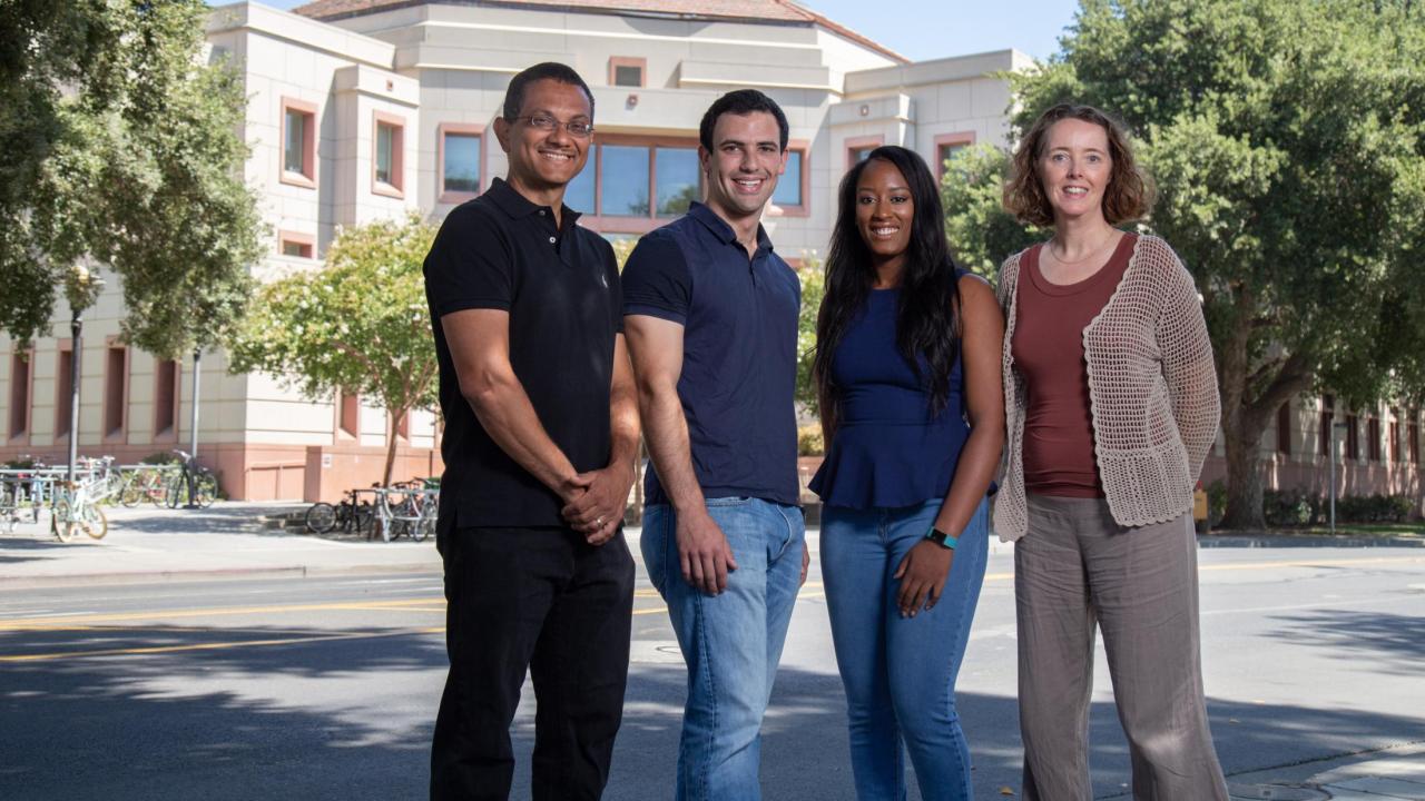 Aldrin Gomes, Leib Lipowsky, Tayler Smith and BUSP Director Connie Champagne stand outside the Life Sciences Building. David Slipher/UC Davis