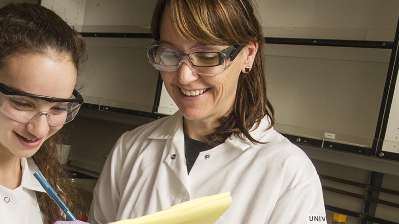 Researchers in lab setting